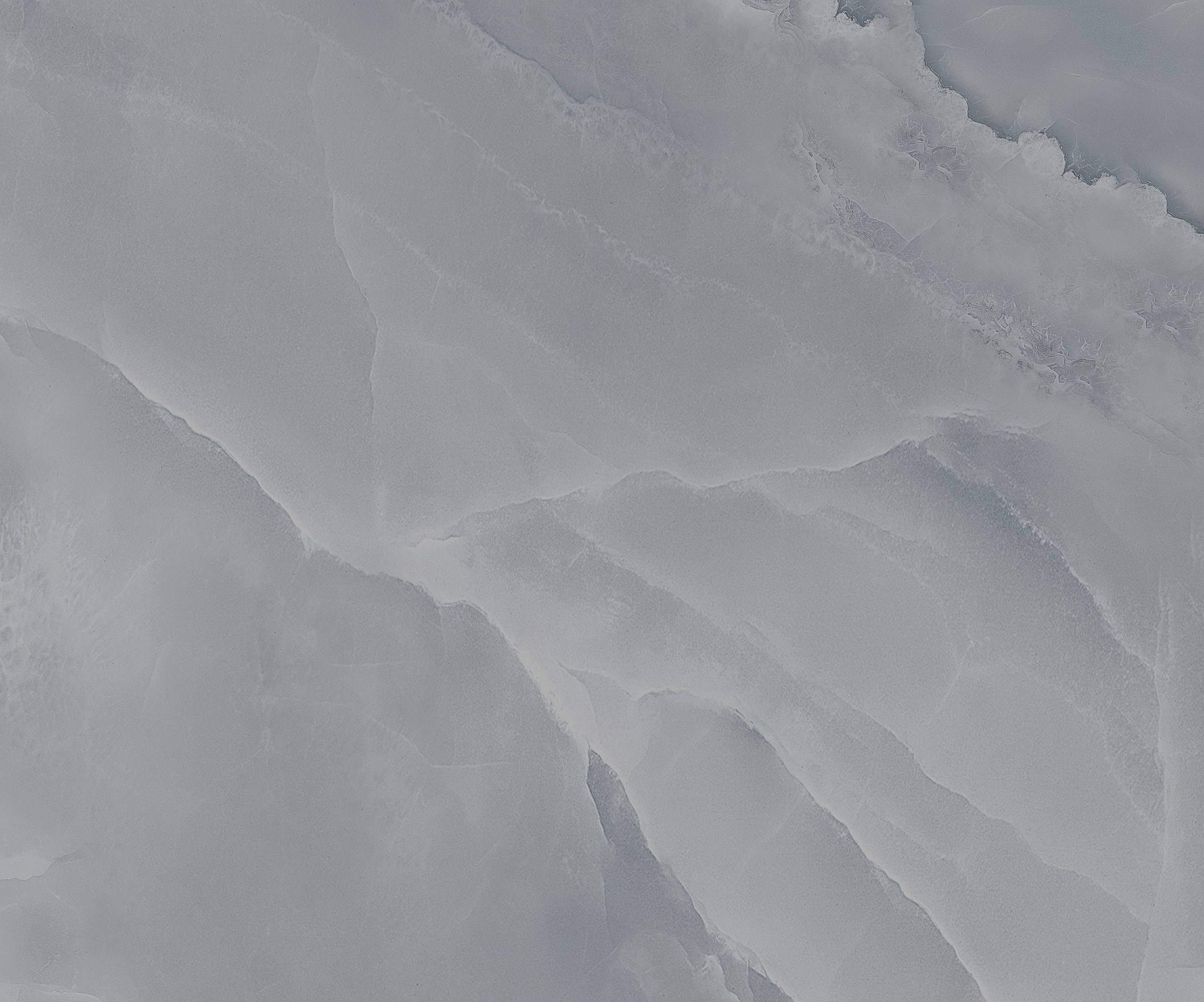 Light gray ice texture background with subtle patterns.