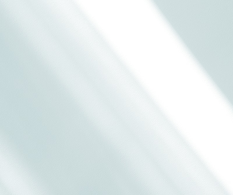 Soft blue background with gentle light streaks.