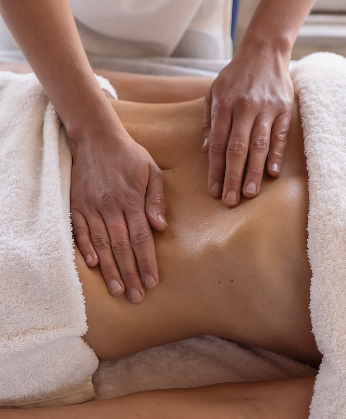 Textured icy surface with soft gray tones.