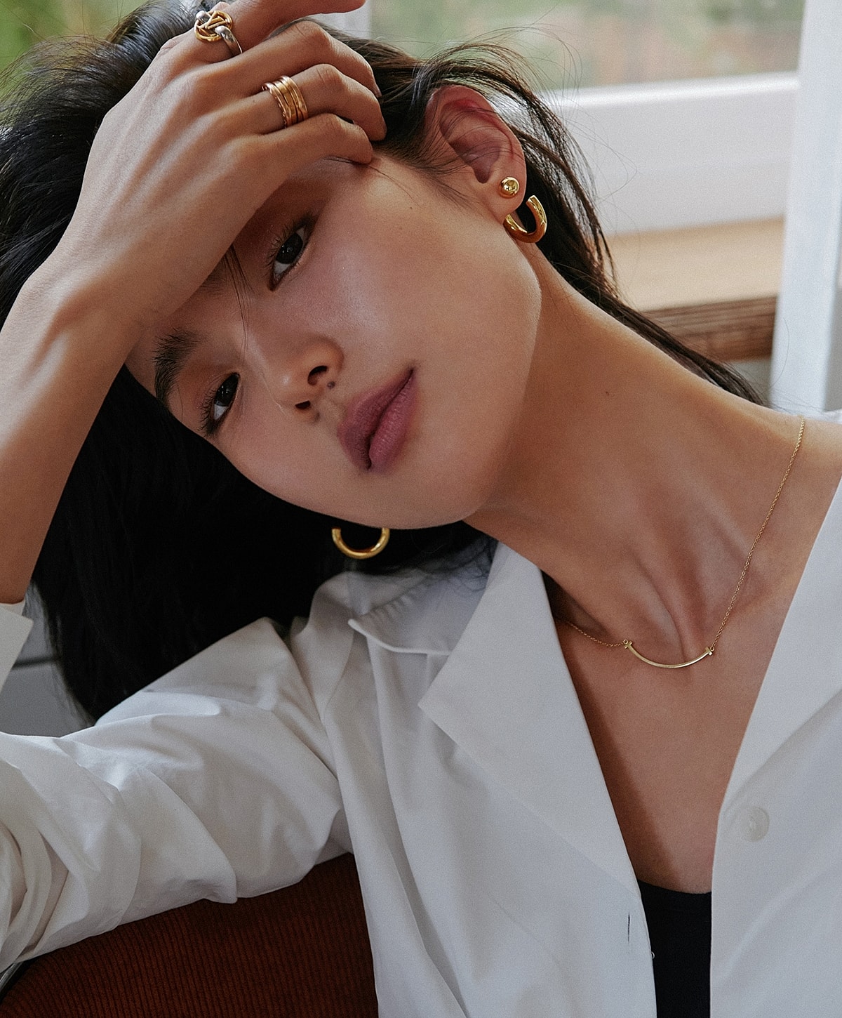 Model in blue activewear striking a pose.